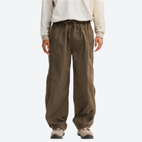 
                  
                    Unisex lightweight quick-dry hiking pants - brown hiking pants with cream top, front view, for travel and camping
                  
                