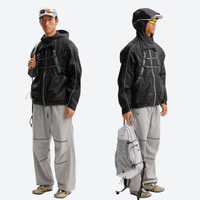 
                  
                    Detachable hood waterproof outdoor jacket - black jacket views, on-model back hood view, for mountain and trail activities
                  
                