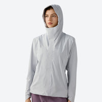 
                  
                    Women's breathable waterproof outdoor jacket - light gray waterproof softshell jacket views, on-model back view
                  
                