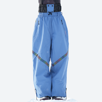 
                  
                    Colorblock snowboard jacket and pants set - women's blue pants with black base layer, for skiing and snowboarding
                  
                