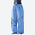Waterproof snow jacket and pants set - blue, on-model front with upright snowboard, for resort and backcountry days