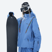 
                  
                    Colorblock snowboard jacket and pants set - blue, on-model front holding snowboard, for resort and backcountry days
                  
                