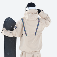 
                  
                    Colorblock snowboard jacket and pants set - women's blue colorblock pants with black base layer, on-model front view
                  
                