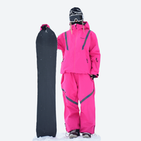 
                  
                    Breathable ski jacket and snow pants combo - blue and black colorblock, on-model back hood view, for powder and piste riding
                  
                