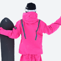 
                  
                    Colorblock snowboard jacket and pants set - red, on-model back hood view, for powder and piste riding
                  
                