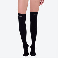 
                  
                    Women's thermal wetsuit suit with stockings - black and white color variants front views, for swimming and snorkeling
                  
                