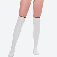 
                  
                    Women's long-sleeve wetsuit with knee-high socks - black and white color variants front views
                  
                