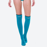 
                  
                    Women's long-sleeve wetsuit with knee-high socks - close-up details of zippers seams and anti-slip strips, YKK zipper
                  
                