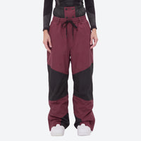 
                  
                    Waterproof snow jacket and pants set - lavender, on-model front with upright snowboard, for resort and backcountry days
                  
                