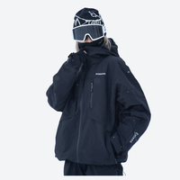 
                  
                    Breathable ski jacket and snow pants combo - black, on-model front with upright snowboard, for skiing and snowboarding
                  
                
