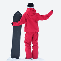 
                  
                    Colorblock snowboard jacket and pants set - cream, on-model front holding snowboard, for resort and backcountry days
                  
                