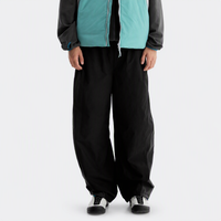 
                  
                    Black outdoor utility pants worn front view
                  
                
