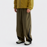 
                  
                    Deep army green outdoor utility pants worn side view
                  
                