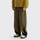Deep army green outdoor utility pants worn side view