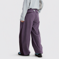 
                  
                    Smoky purple outdoor utility pants worn rear three-quarter view
                  
                