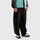 Black outdoor utility pants worn rear view