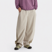 
                  
                    Light khaki outdoor utility pants worn rear view
                  
                