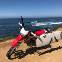 
                  
                    Motorcycle surfboard carrier mount - rack mounted on scooter with surfboard lifestyle shots, on-model back view
                  
                