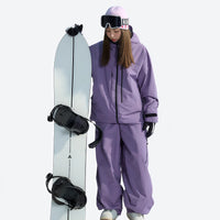 
                  
                    Women's breathable 3-layer padded ski jacket - pink jacket with gray pants, for resort and backcountry days
                  
                