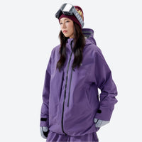 
                  
                    Women's breathable 3-layer padded ski jacket - purple insulated jacket, on-model front view, for resort and backcountry days
                  
                