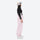 Women's 2-layer snowboard jacket and bibs - light pink bib pants with black top, for powder days and winter commute