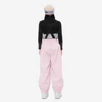 
                  
                    Women's 2-layer snowboard jacket and bibs - light pink bib pants with black top, for resort and street wear
                  
                