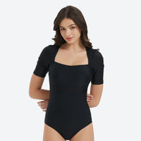 
                  
                    Women's fashion rashguard with cutout and skirt options - short sleeve square neck open-back rashguard views
                  
                
